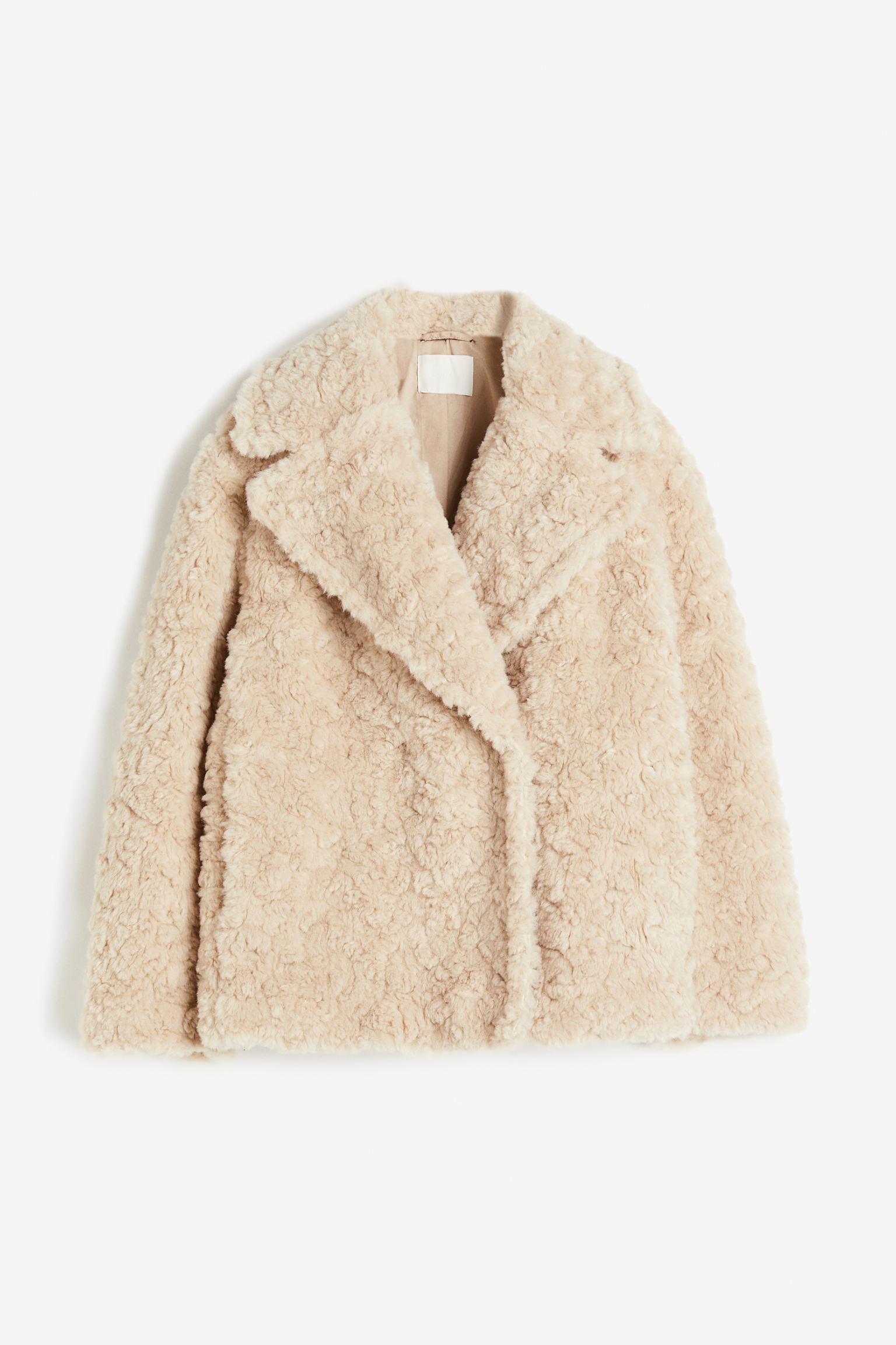 Veste en peau lainée H&M (59,99 euros).
