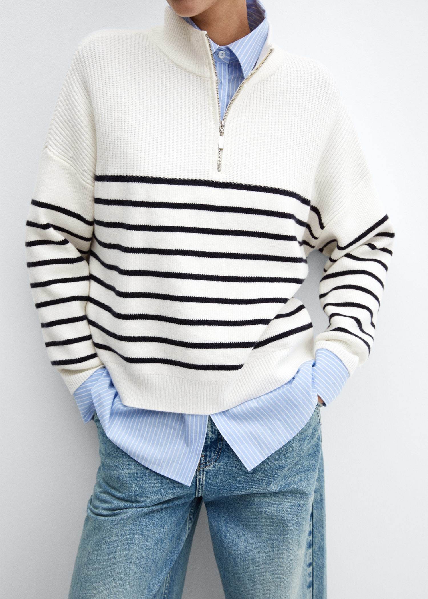 Pull rayé mangue.