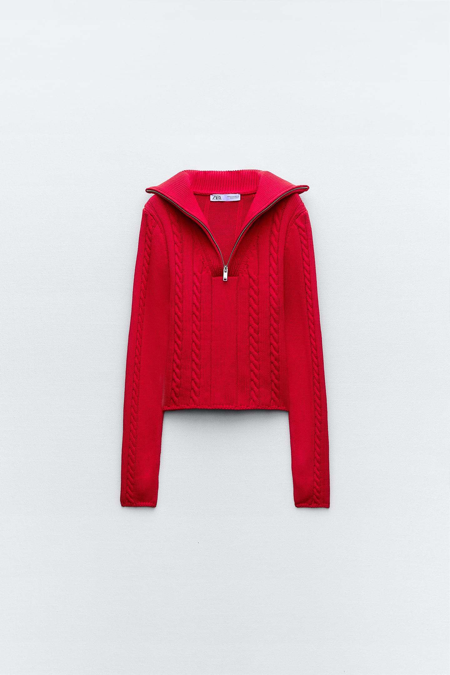 Pull rouge Zara.