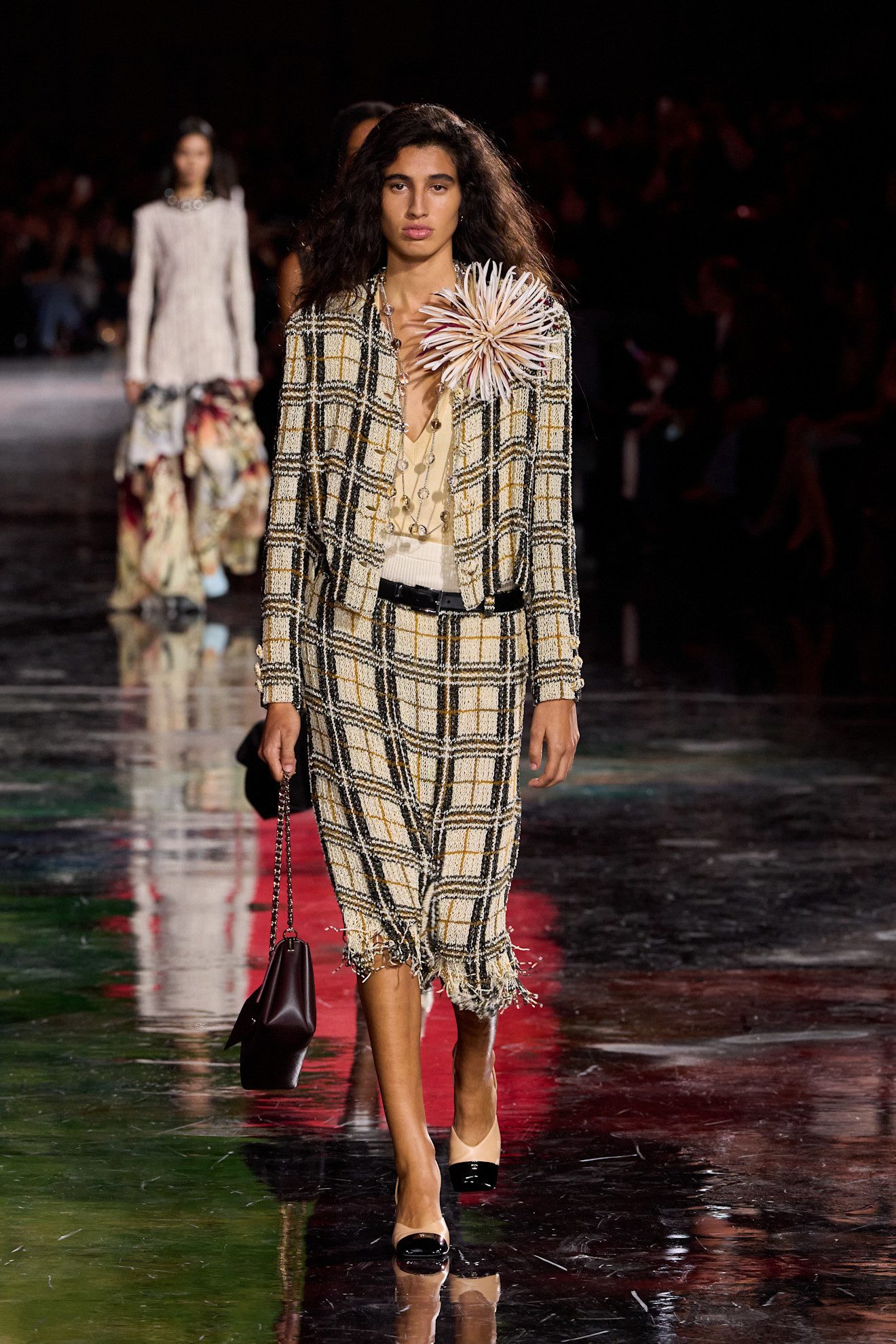 Les costumes de Tweed dans le défilé de Chanel.