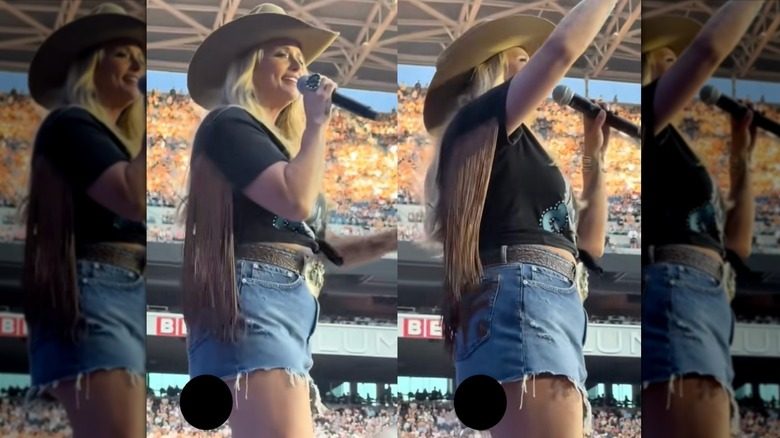 Miranda Lambert chante sur scène lors d'un concert en jupe courte