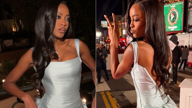 Ciara Miller posant avec des cheveux bouclés dans une robe en satin