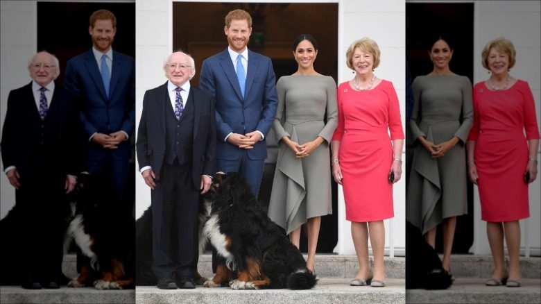 Meghan Markle porte une robe midi grise et un sac noir