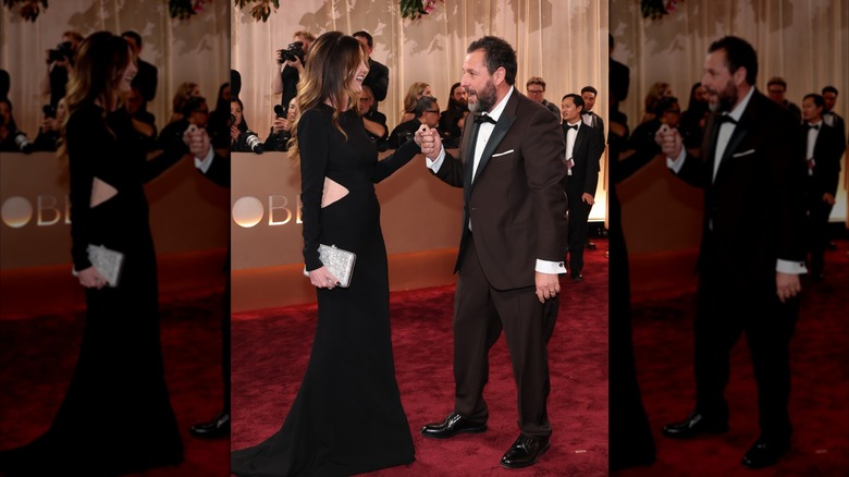 Jackie Sandler tient la main d'Adam Sandler