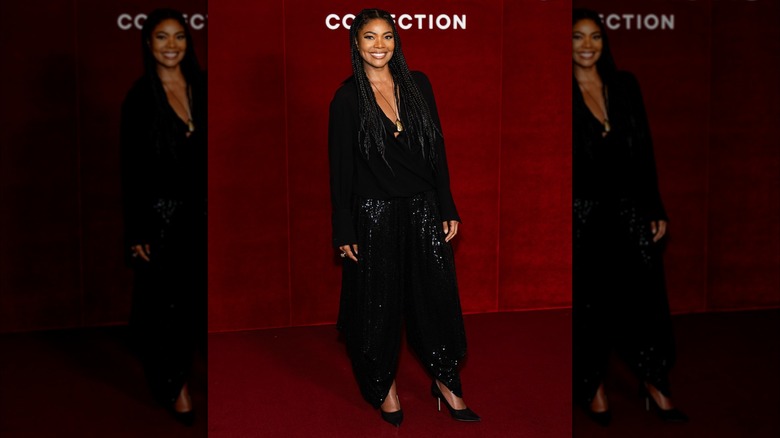 Gabrielle Union dans une veste noire et un pantalon fluide