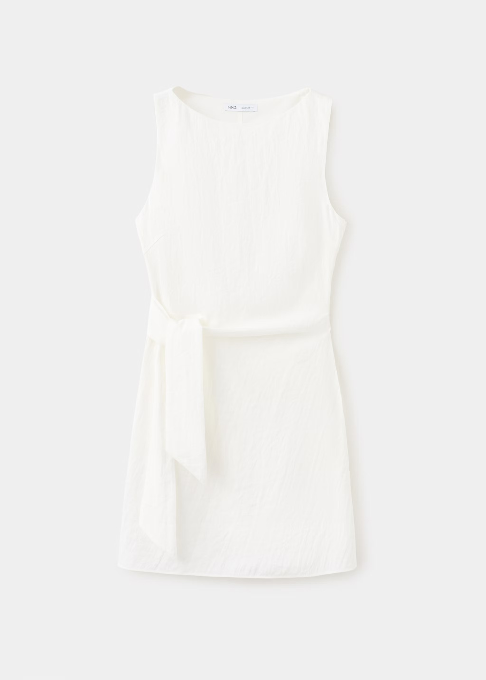 Robe courte blanche de Zara (19,99 euros). Réf. 27019081/05/00