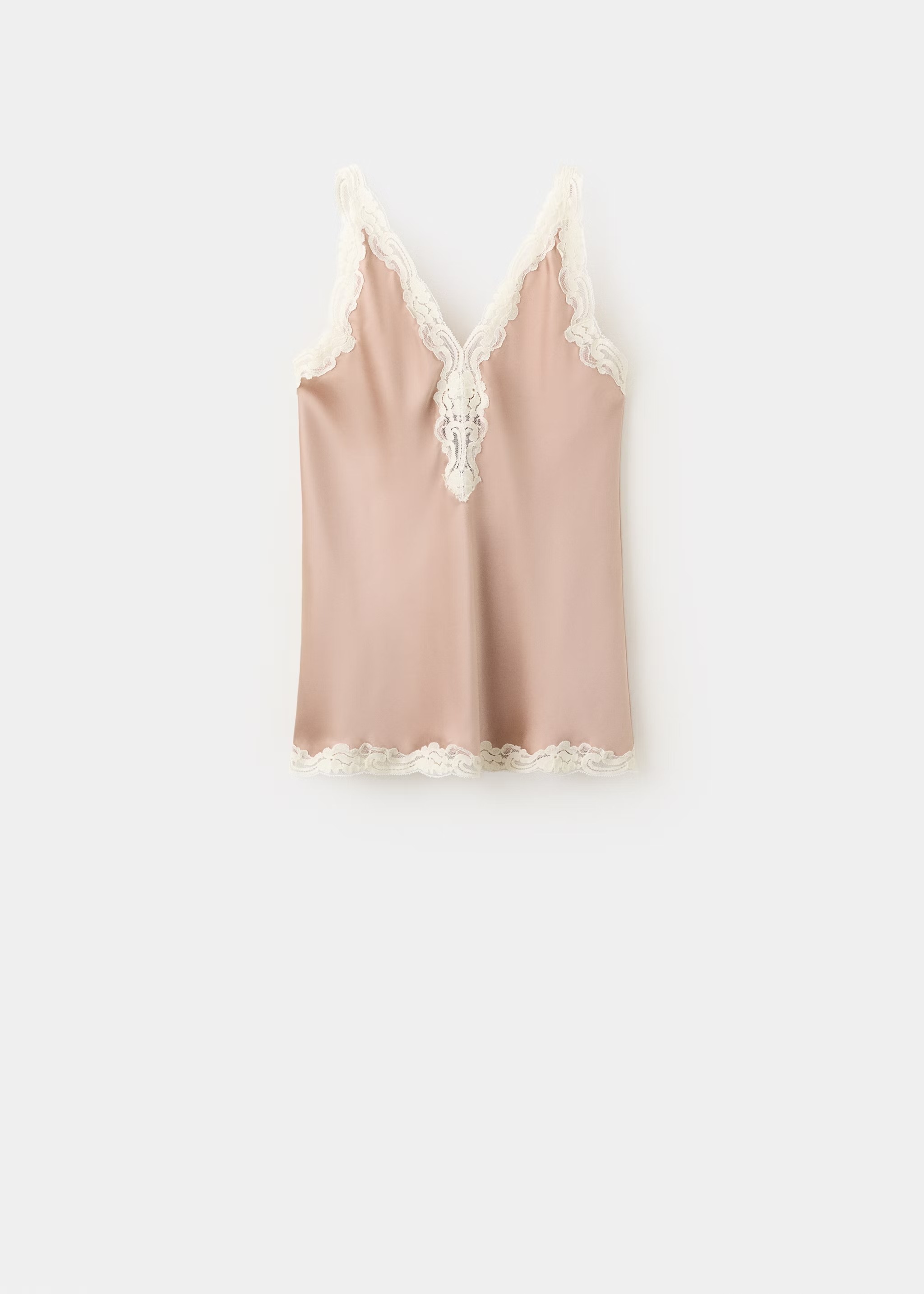 Haut rose poussiéreux avec bordure en dentelle.