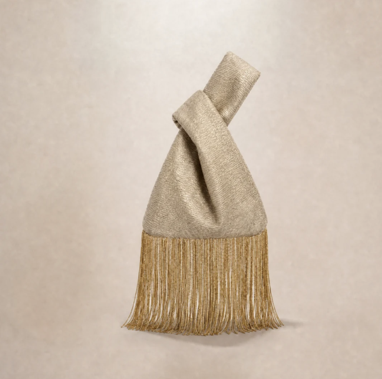 Sac 100% soie avec perles dorées de la collection avec Paloma Herce (125 euros)