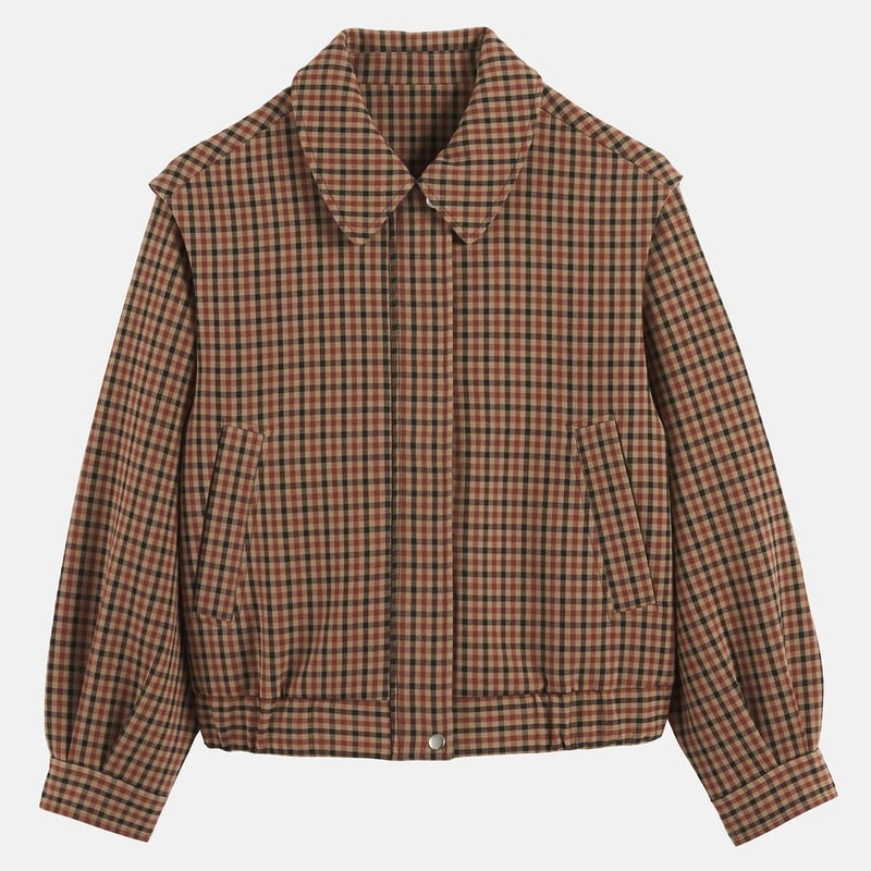 Veste à carreaux avec épaulettes marquées.