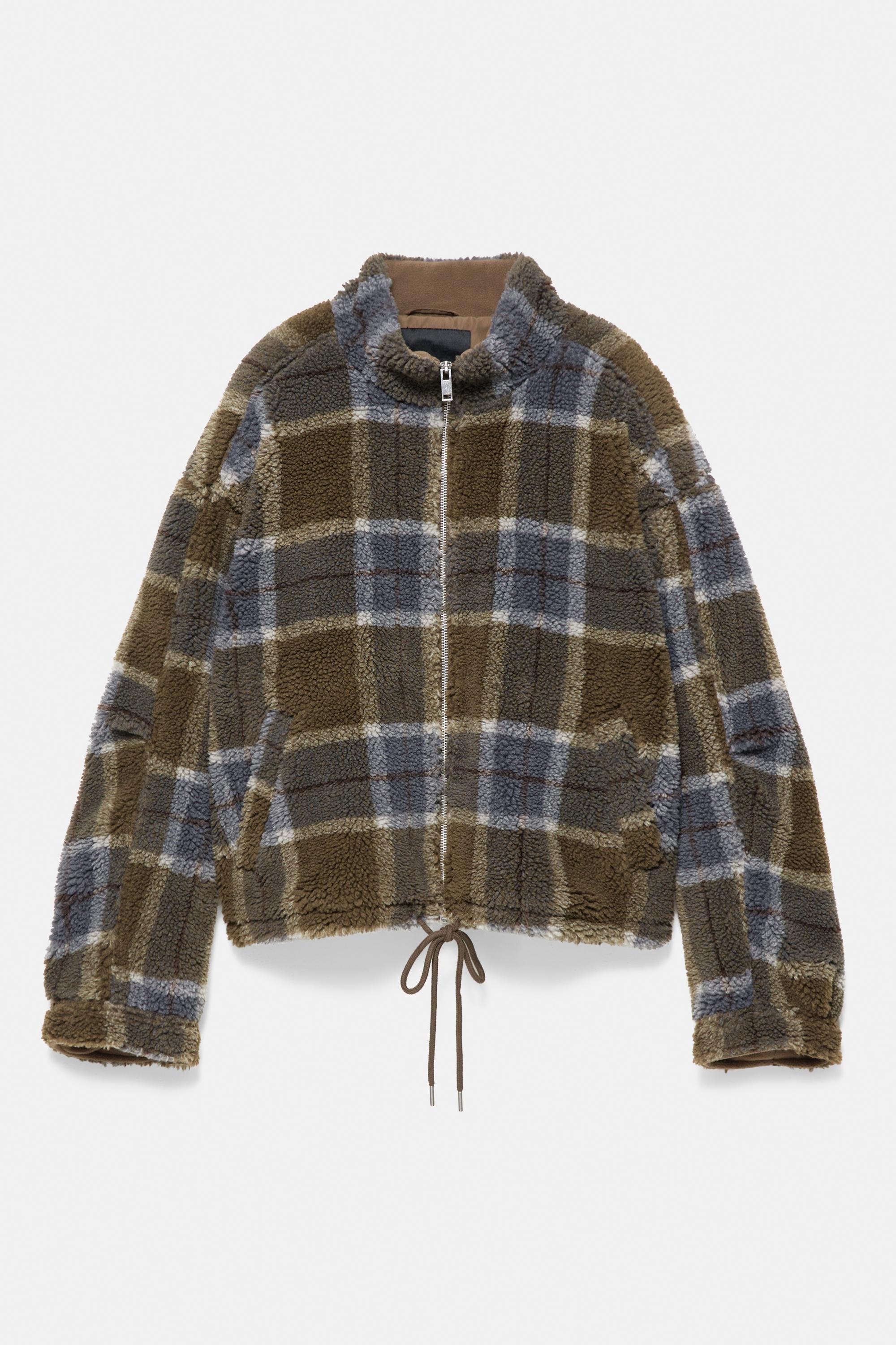 Veste oversize en peau retournée à carreaux.