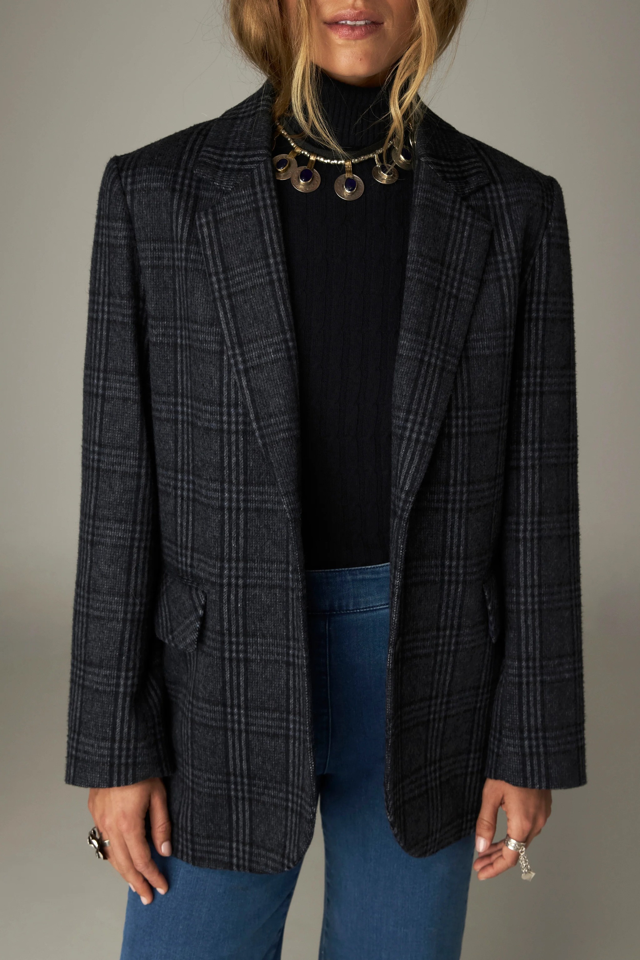 Blazer en laine à carreaux.