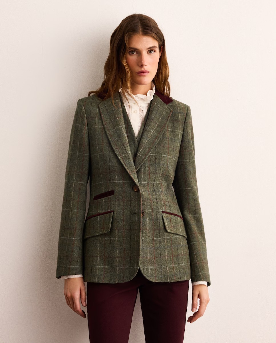 Veste en laine à carreaux avec col en velours.
