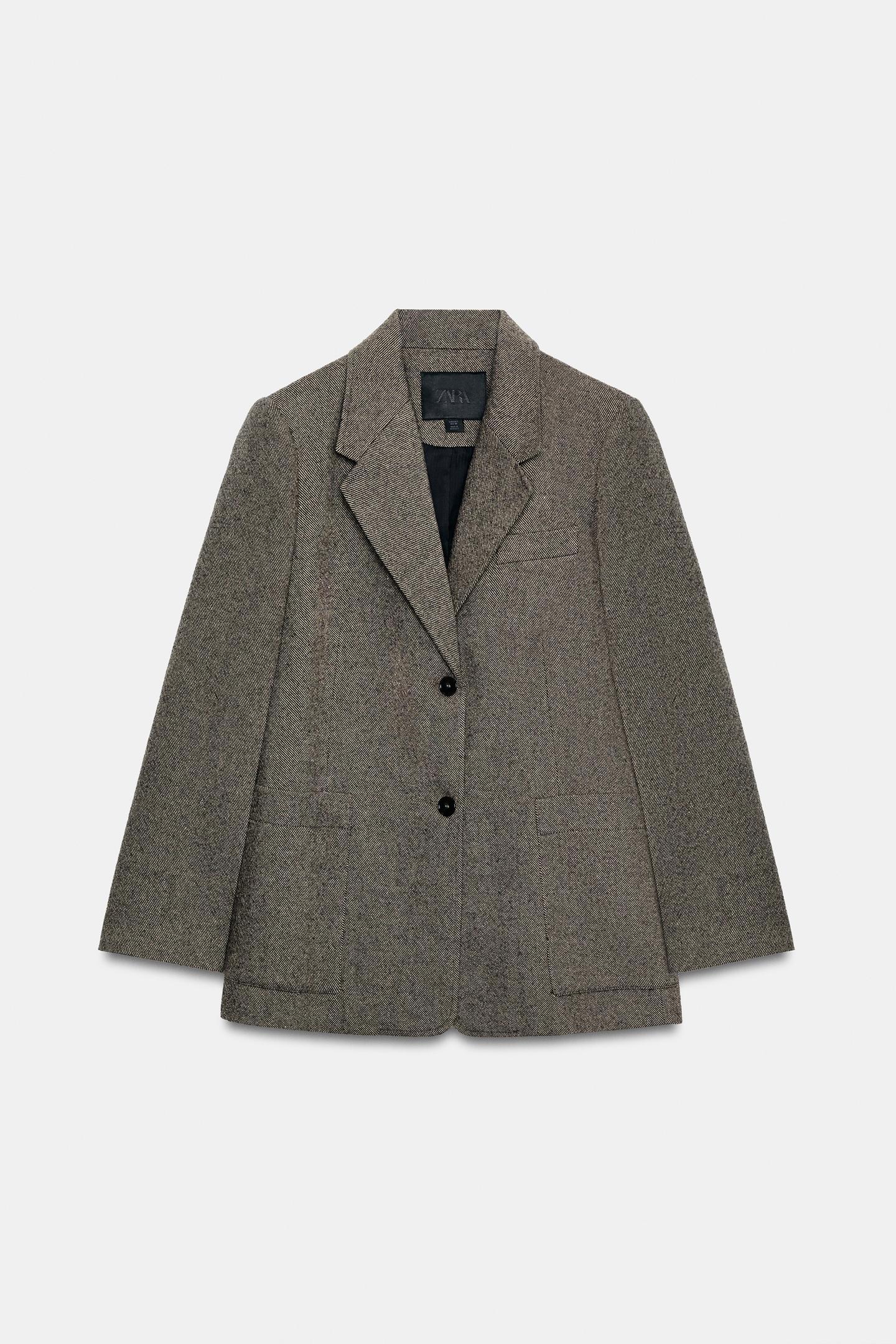 Veste en laine grise.